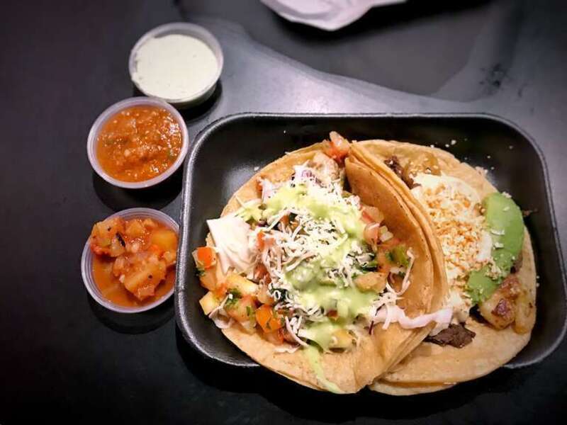 Surf and turf taco and seafood taco at Tacos El Gordo in Chula Vista, California