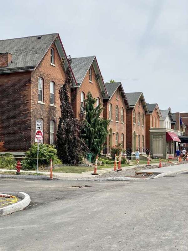 Built between 1870 and 1878, these three-bay two-and-a-half-story Italianate-style houses were constructed by William Tifft to serve as housing for the middle class of the then-booming city of Buffalo, and were originally all identical.  The houses