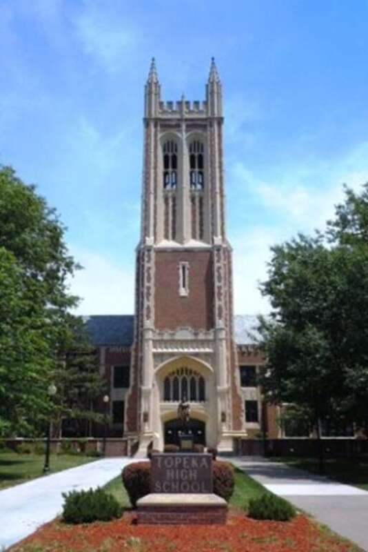 Topeka High School, showing the main entrance and bell tower, at 800 SW 10th Ave, Topeka, KS 66612. Taken nearly three months after the March 31, 2011, installation of a Trojan warrior statue, which is visible in this photograph. The bell tower plays