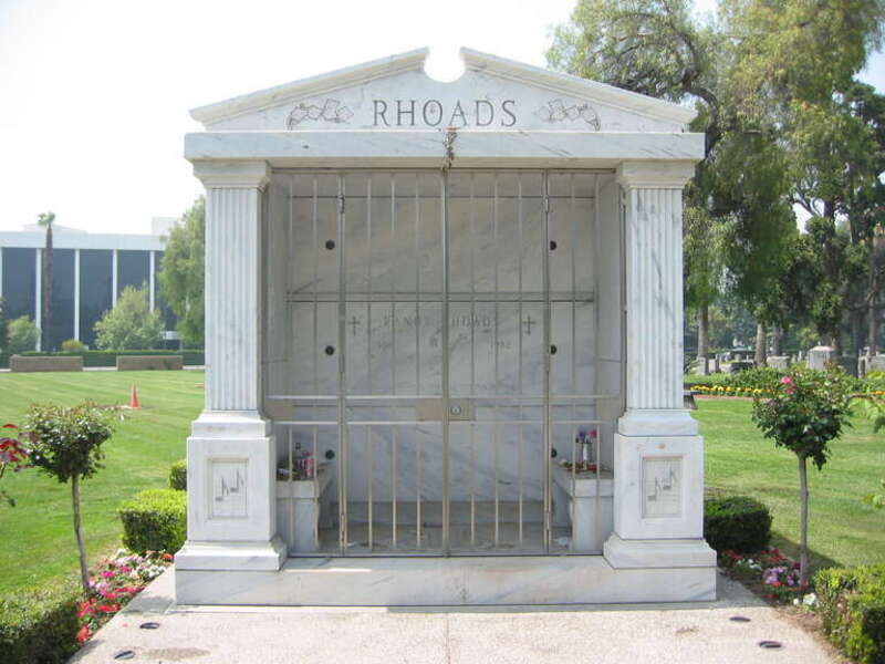 Tomb of Randy Rhoads. Photo taken on 8 May, 2006 in San Bernardino, California.
I am the author of this photograph and I hereby release it into the public domain.

Note the lipstick "kisses" all over the tomb.
