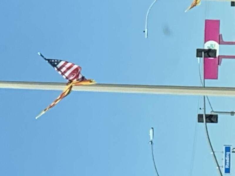 Those flags were placed on the street pole for Lunar New Year. This was taken the day before it was taken down by the city.