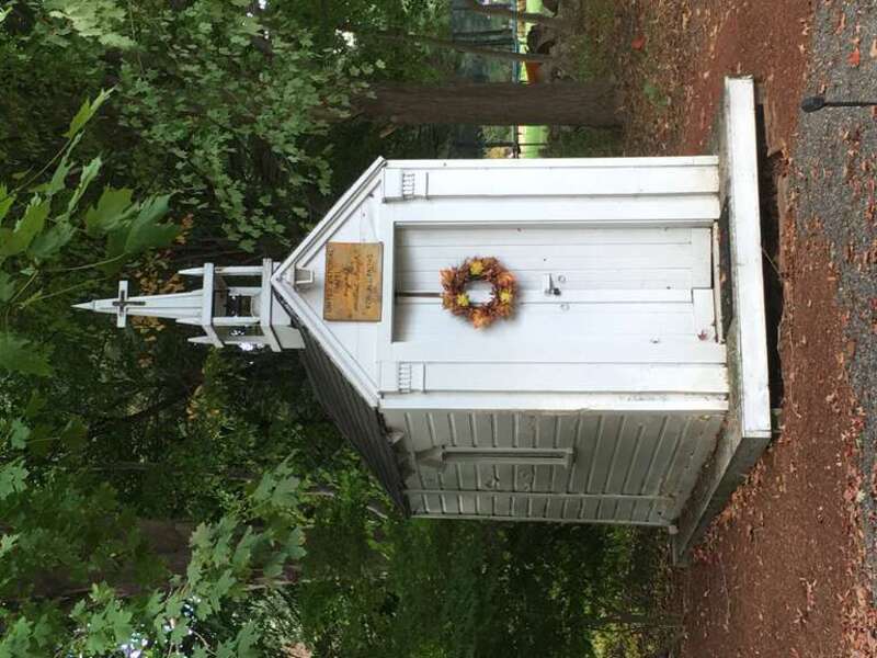 Union Church of All Faiths in Hudson, Massachusetts, USA. Photographed September 24, 2019, from Causeway Street. This is a small chapel originally built by Rev. Louis W. West, a retired minister, in the 1950s. During most of that time it was located