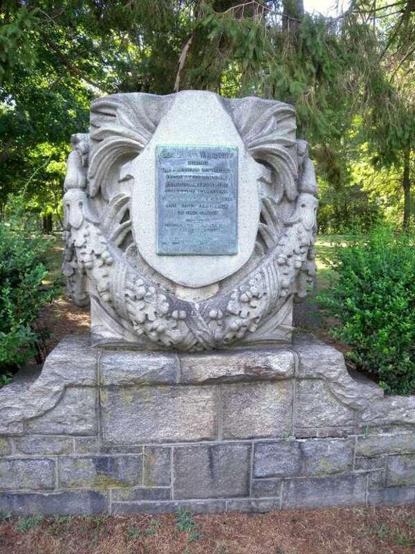 Looking northwest from Seminary Avenue at stone historical marker for Valentine house on a mostly sunny early afternoon.  See File:Valentine Yonkers steel marker jeh.jpg for steel marker.
