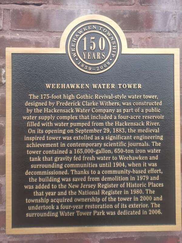A plaque at the Weehawken Water Tower Park, it reads:
Weehawken Water Tower
The 175-foot high Gothic Revival-style water tower,
designed by Frederick Clarke Withers, was constructed
by the Hackensack Water Company as part of a public
water supply