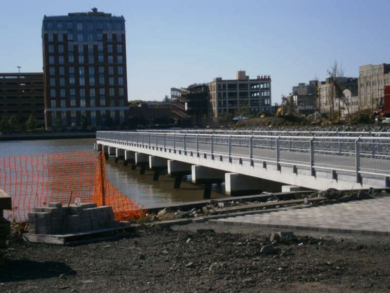 Weehawken Cove — Looking southwest at the HRWW (Hudson River Waterfront Walkway) in Weehawken (foreground) and Hoboken (background), New Jersey.