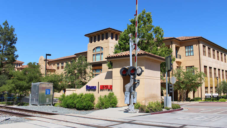 This office building at 100 Winchester Circle in Los Gatos, California has been home to Netflix headquarters since the company moved from Sunnyvale.  In 2016, Netflix subleased this office building to Roku but continued to maintain its headquarters