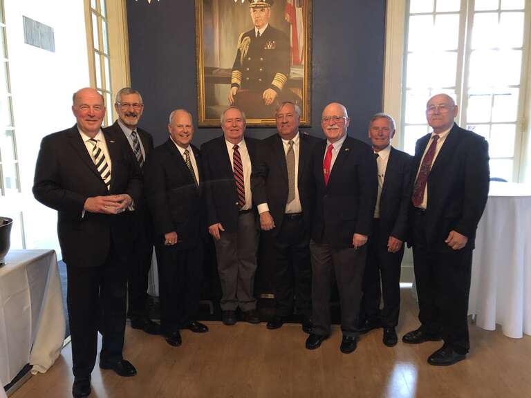 Micajah Newman, Dave Laws, Walt Havenstein, Bob Capra, Bill Williams, Ed Kellogg, Bill Organek and Jim Elfelt. Missing from picture Ruben Torres at Pre-Ceremony Reception at Naval Academy Club