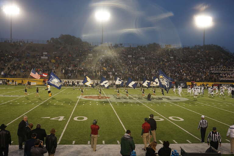Georgia Southern entering the field before the 2018 Camellia Bowl (Georgia Southern Eagles vs. Eastern Michigan Eagles) at the Cramton Bowl in Montgomery, Alabama (United States). Georgia Southern won 23–21.