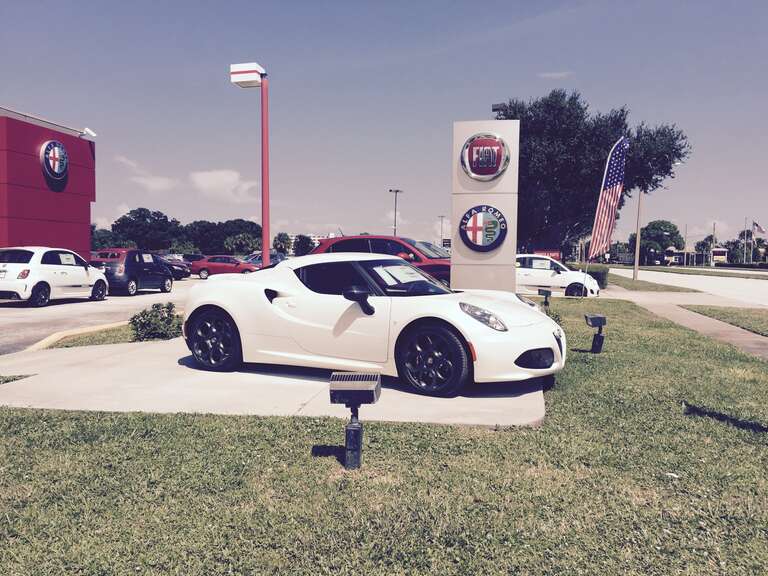 Alfa Romeo 4C Coup 2015 at the Alfa Romeo of Melbourne, 300 East NASA Boulevard, Melbourne, Florida.