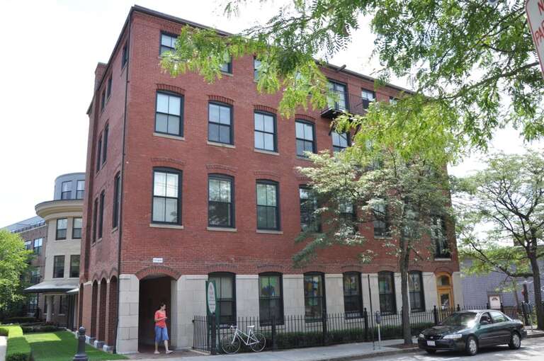 A photograph of the historic Ritchie Building in Brookline, Massachusetts.