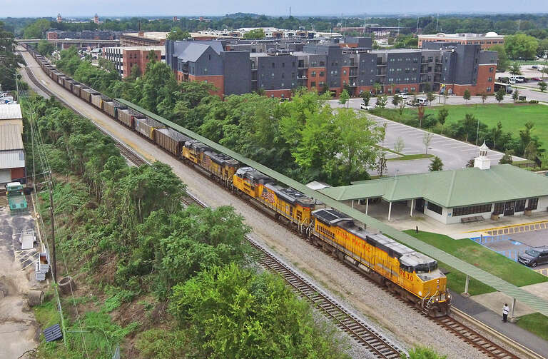 CSX W222-26 is northbound through The Ditch in Columbia, SC, heading for the CN&amp;amp;L Subdivision.  Powering the train is a trio of Union Pacific motors consisting of a C44-9W, SD70AH, and SD70ACe.