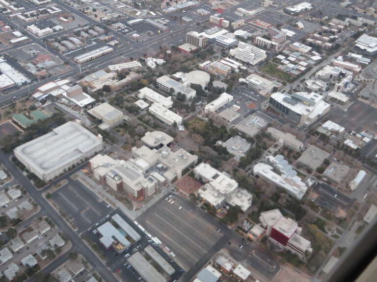 University of Nevada-Las Vegas (UNLV) is a public research university located in the Las Vegas suburb of Paradise, Nevada, USA. The 358-acre (145 ha) campus is located approximately 1.5-mile (2.4 km) east of the Las Vegas Strip. The university