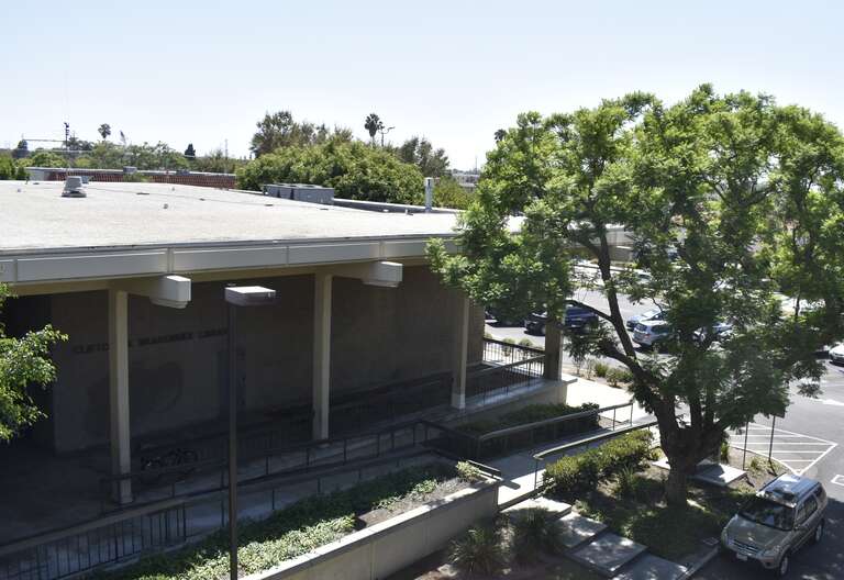 Clifton M. Brakensiek Library northern entrance, seen from the top of the neighboring parking structure on 10 August 2019