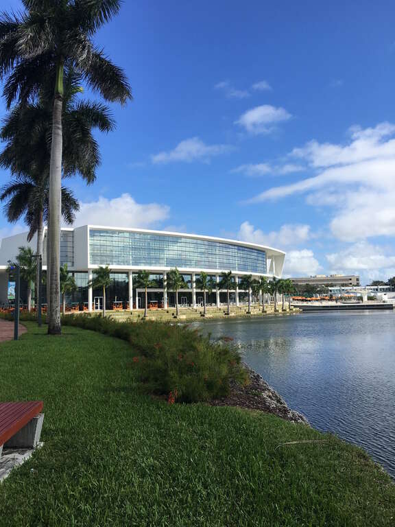 photo of the Donna E. Shalala Student Center. To the left is the lakeside patio outside of The Rat.