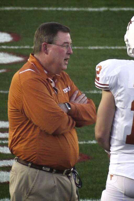 Greg Davis talking to Colt McCoy before the 2010 BCS National Championship Game.