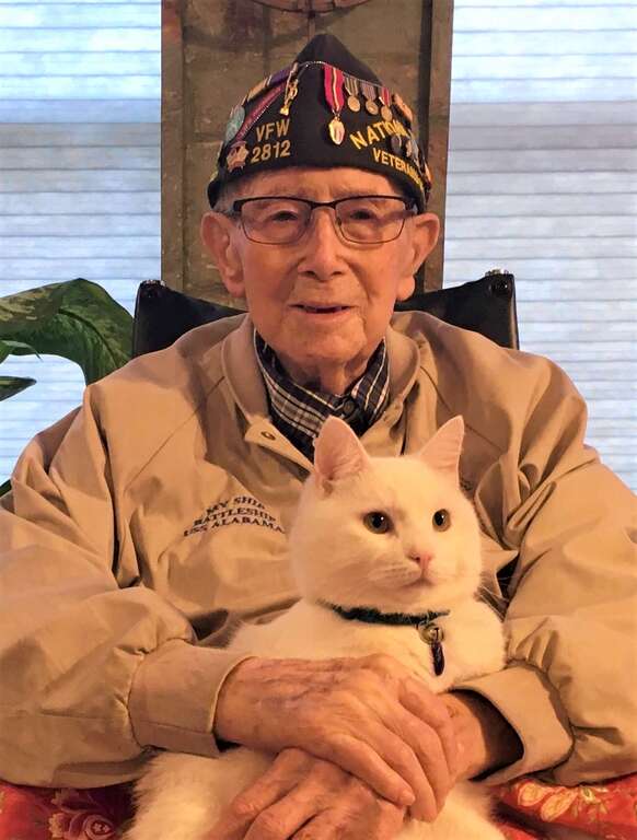 John with his cat Coconut on January 1 2021