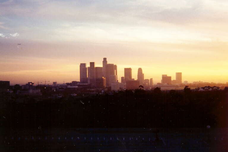 The spectacular view of the Los Angeles skyline seen from Dodger Stadium.  Los Angeles, (Spanish for &quot;The Angels&quot;) is the second most populous city in the United States, the most populous city in the state of California and the western United States,