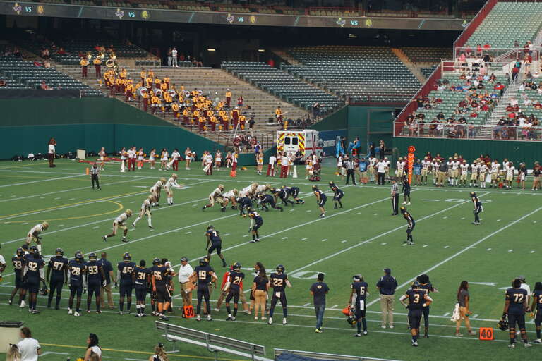 Midwestern State on offense during the Midwestern State Mustangs vs. Texas A&amp;amp;M–Commerce Lions football game at Choctaw Stadium in Arlington, Texas (United States). Midwestern State won 31–30.