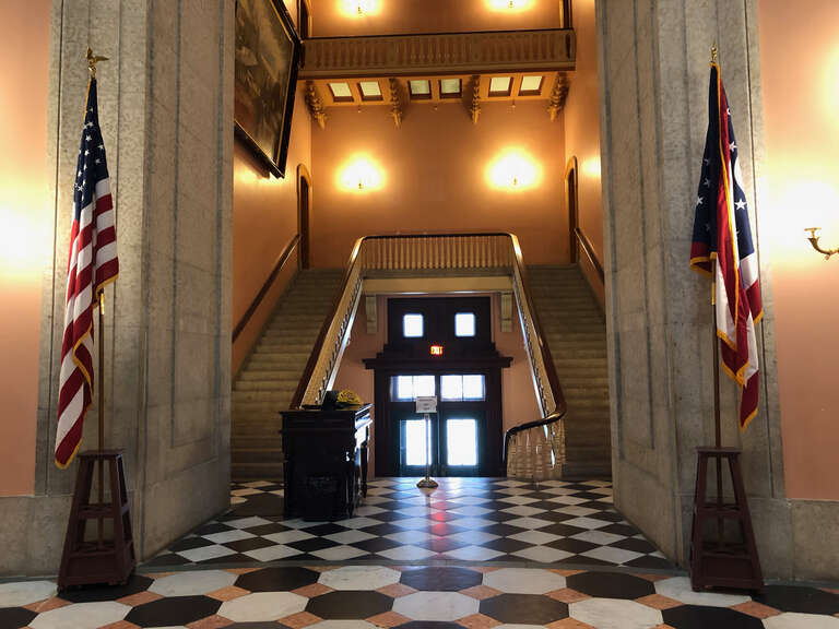 The foyer leading to the west entrance of the Ohio Statehouse, as seen from the rotunda.
