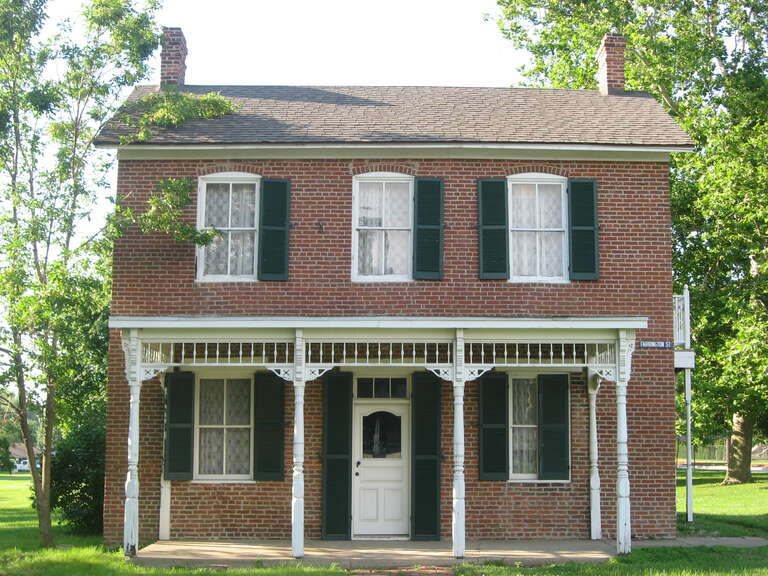 Front of the Paul Dresser Birthplace, located on the northwestern corner of the junction of First and Farrington Streets in Terre Haute, Indiana, United States.  Built in 1850, it is listed on the National Register of Historic Places.