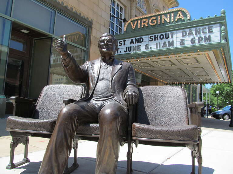 A statue of film critic Roger Ebert giving his trademark &quot;thumbs up&quot; gesture outside the Virginia Theater in Champaign, IL