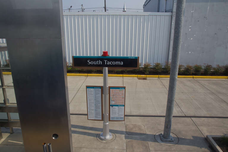 South Tacoma Station is connected to a 220 stall surface lot.  Since Sounder service has not yet commenced, the platforms are fended off.  Currently the station is served exclusively by route 593.  Route 593 operates from here to Tacoma Dome station