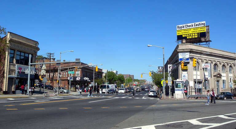 Looking east across Clinton Avenue and along Springfield Avenue (County Road 603) in the middle of town on a sunny midday.