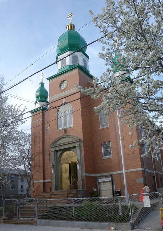 Looking north at Ukrainian Orthodox Church on a sunny early afternoon in peach blossom season.