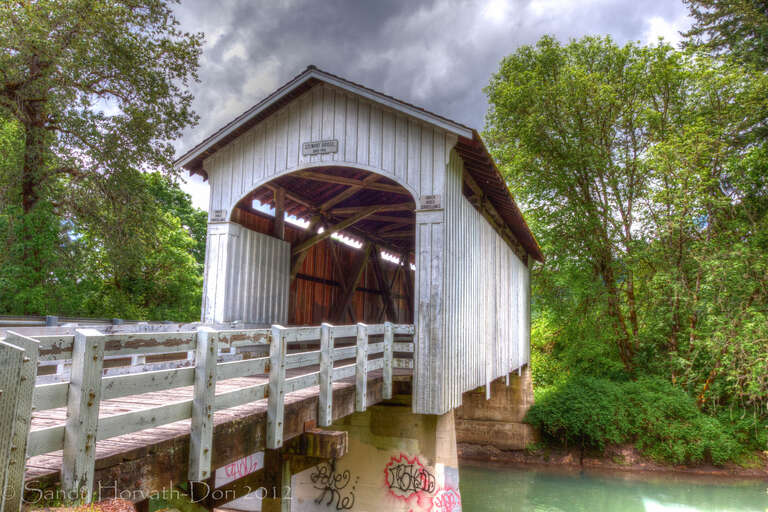 As with other wooden bridges in Oregon, the Stewart Bridge has had its share of woes. Heavy rains of the 1964 "Christmas Flood" brought water raging down Mosby Creek with the resulting force cracking the lower chords of the bridge.
Just over four