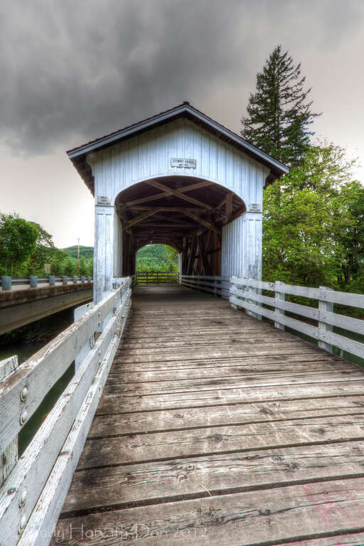 As with other wooden bridges in Oregon, the Stewart Bridge has had its share of woes. Heavy rains of the 1964 "Christmas Flood" brought water raging down Mosby Creek with the resulting force cracking the lower chords of the bridge.
Just over four