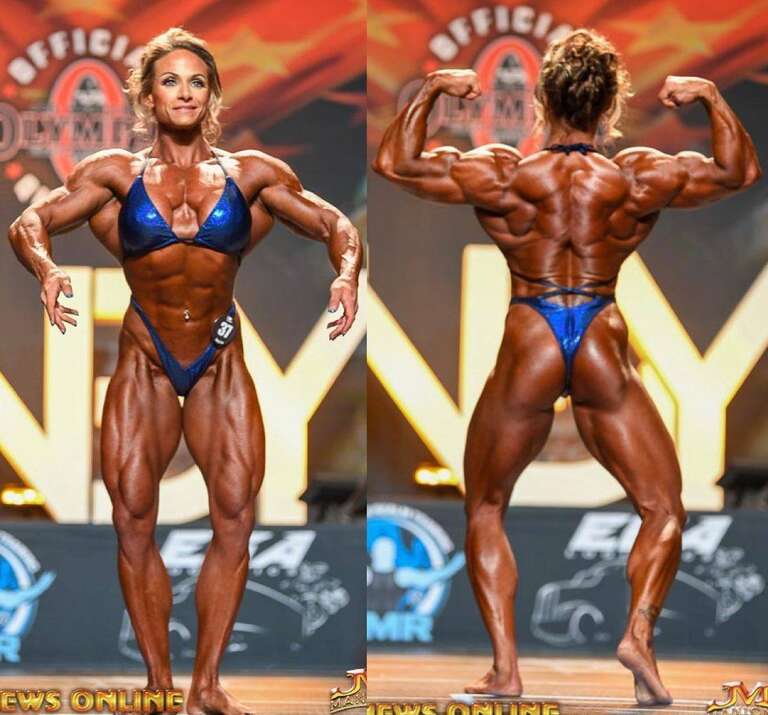 Theresa Ivancik doing a back double bicep pose at the 2022 IFBB Indy Pro.