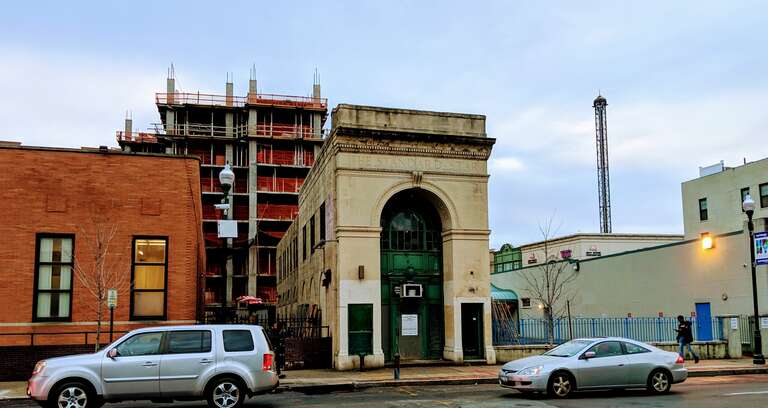 The Space Needle (185'x8'x8') ride atop New Roc City is a 12 seat roller coaster type ride