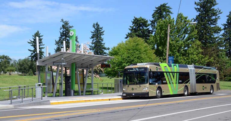 The westbound Marshall/Luepke Community Center station of C-Tran's &quot;The Vine&quot; service, on E. McLoughlin Blvd., with a bus arriving.