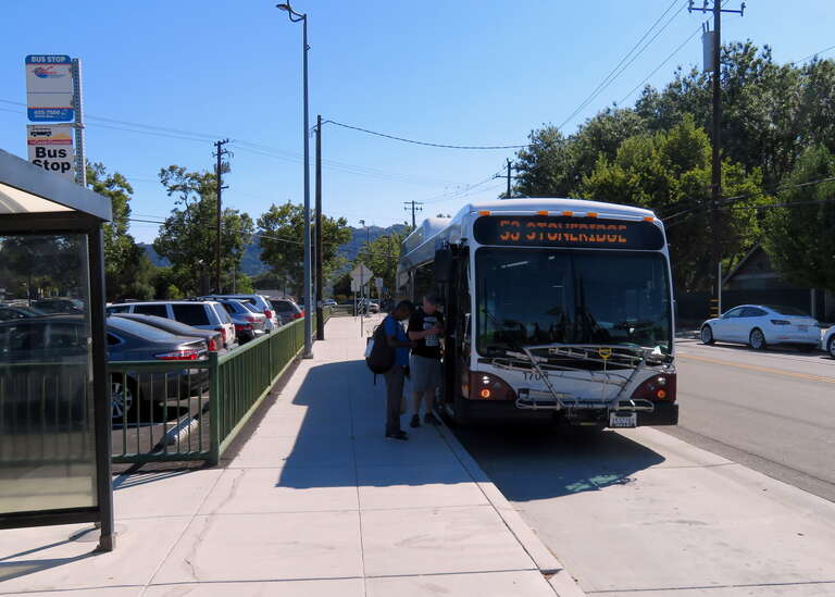 A WHEELS bus waiting for an eastbound ACE train at Pleasanton station in July 2018