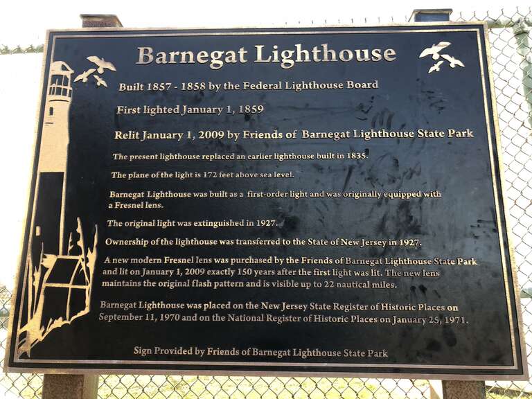 Plaque describing the history of Barnegat Lighthouse within Barnegat Lighthouse State Park in Barnegat Light, Ocean County, New Jersey