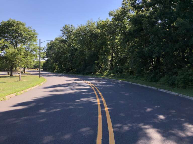 View southwest along Jake Garzio Drive at Graphics Drive in Ewing Township, Mercer County, New Jersey