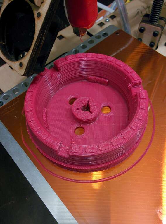 The NAB hub is used to mate 10-inch 'pro' reels to normal reel-to-reel recorder shafts. Here, it is printed on a 3-D printer.// Reel-to-rell recorders and magnetic tape by Sameer Verma, San Francisco State University