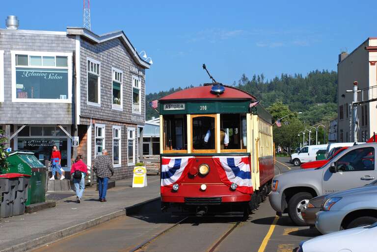 Astoria Riverfront Trolley car 300 eastbound (going away from the camera) just west of 12th Street. This heritage streetcar line in Astoria, Oregon, has been in operation since 1999. Car 300, nicknamed &quot;Old 300&quot;, is an ex-San Antonio (Texas)