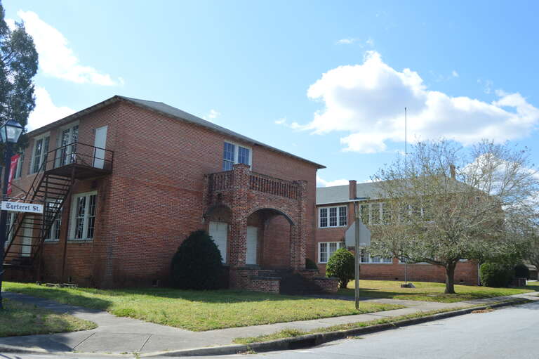 Northern side of the former Bath School, located on Carteret Street (North Carolina Highway 92) west of King Street in Bath, North Carolina, United States.  Built in 1918, it is listed on the National Register of Historic Places.
