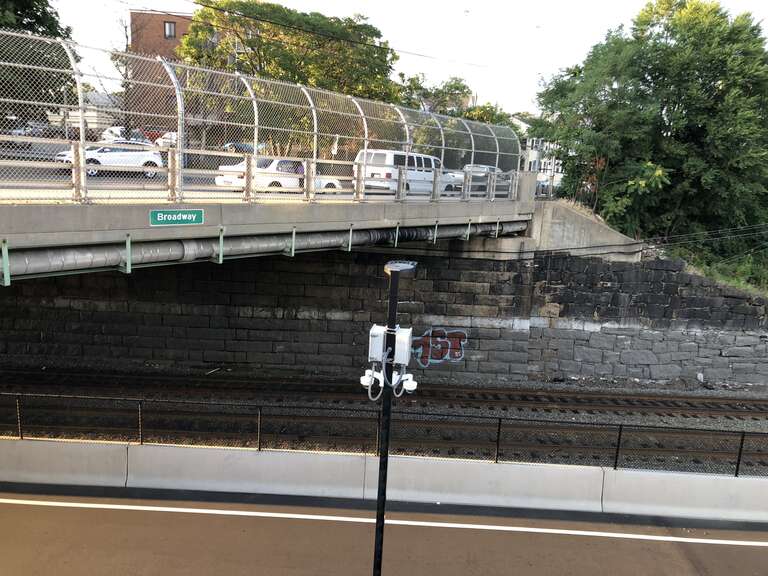 Broadway Bridge, Chelsea MA, commuter rail and Silver Line Gateway busway pass underneath