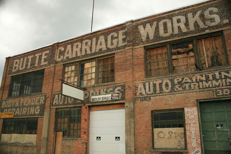 I could not tell if this place was in use of not. It looked run down and unused yet the door seems new with new signs on it.