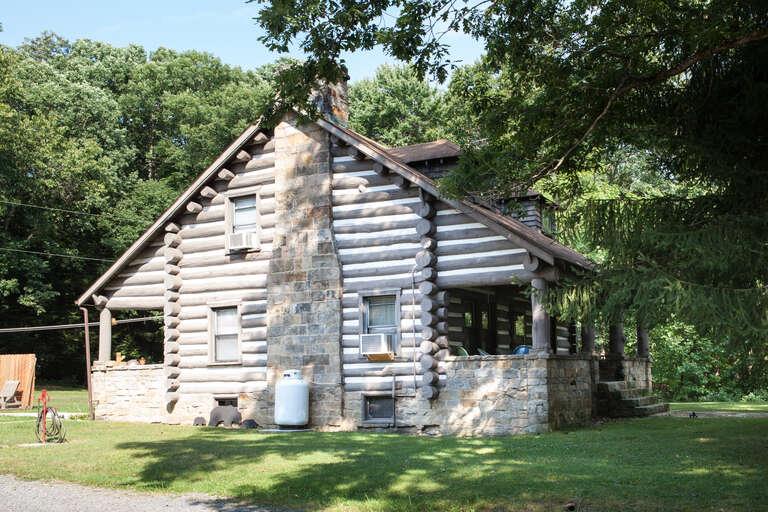 The historic log house, part of Coopers Rock State Forest Superintendent's House and Garage.



This is an image of a place or building that is listed on the National Register of Historic Places in the United States of America. Its reference number