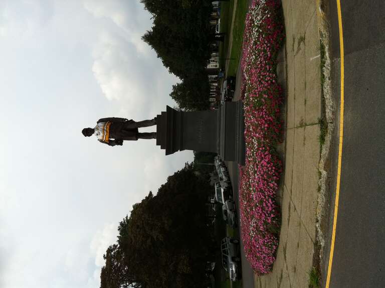 Statue of David G. Farragut dressed in Bruins jersey at Marine Park in City Point, South Boston