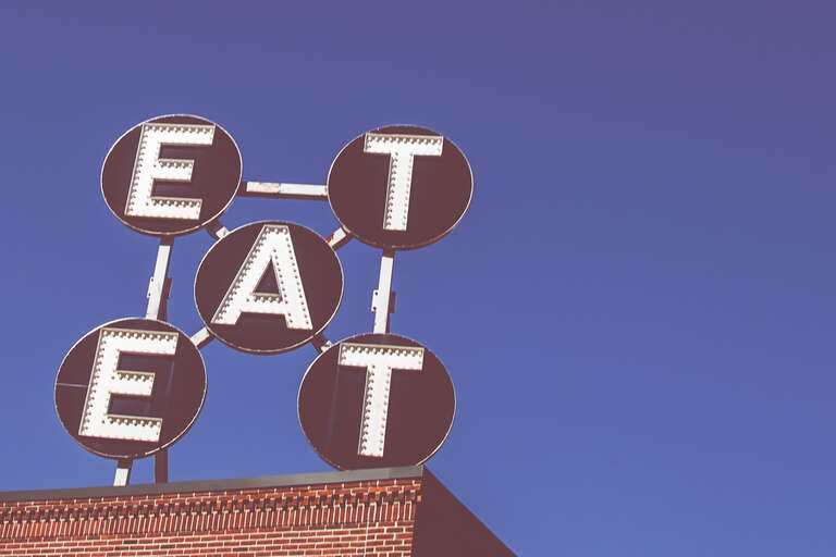 An &quot;Eat&quot; sign along Main Street in Rockland, Maine.