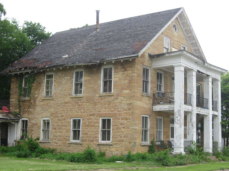 Front and southern side of the Jeremiah Wood House, located at 802 River Street in Sabula, Iowa, United States.  Built in 1866, it is listed on the National Register of Historic Places.