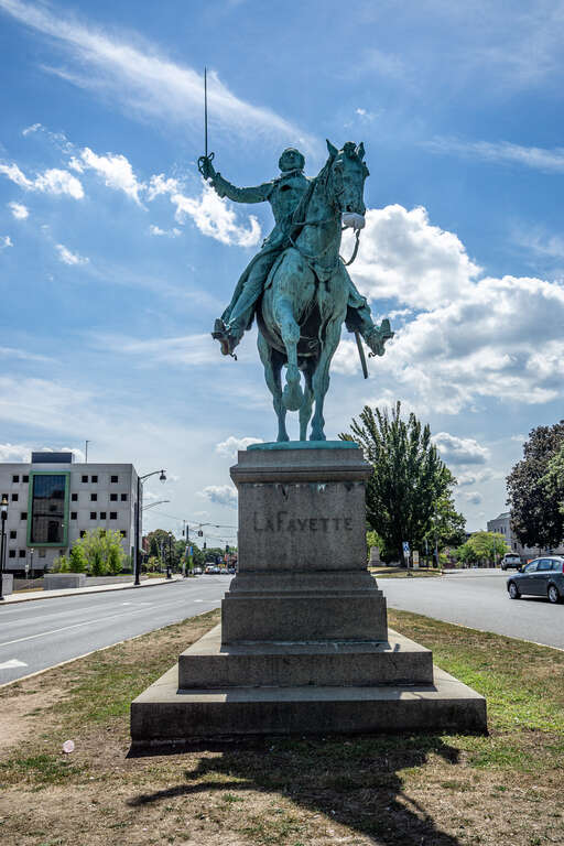 Lafayette Statue in Hartford, Connecticut, dedicated 1932. By sculptor Paul Wayland Bartlett, is a copy of a 1907 statue in Paris. Someone added a COVID mask on the horse.