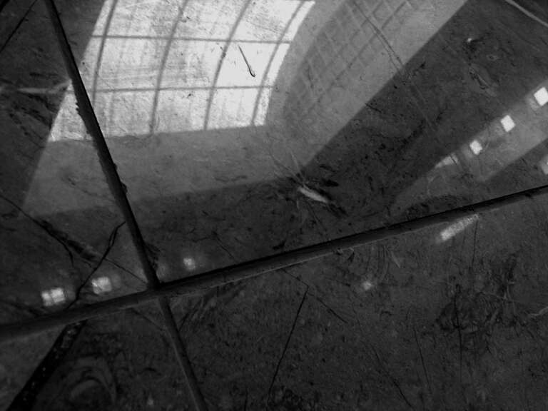 The tiles of a jeweler's wall contain the mirror opposite of the shopping mall I'm standing in.
Submitted to the Flickr group &amp;lt;a href=&quot;https://www.flickr.com/groups/7dayshooting/&quot;&amp;gt;7 Days of Shooting&amp;lt;/a&amp;gt;.
--
Purchase this image and learn