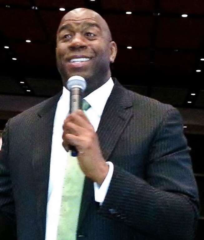 Magic Johnson giving a speech at the George R. Brown Convention Center in Houston, Texas on April 25, 2013.