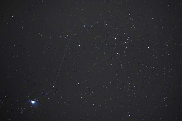 500px provided description: Geminid meteor passing through Orion [#meteor ,#meteor shower ,#geminid]