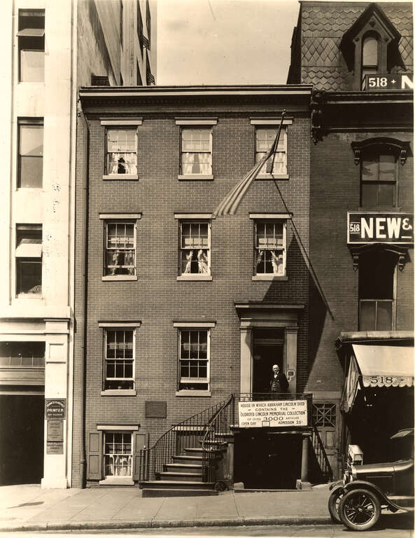 Osborn Oldroyd on the steps of the Petersen House, then housing his Lincoln Museum, 1925.